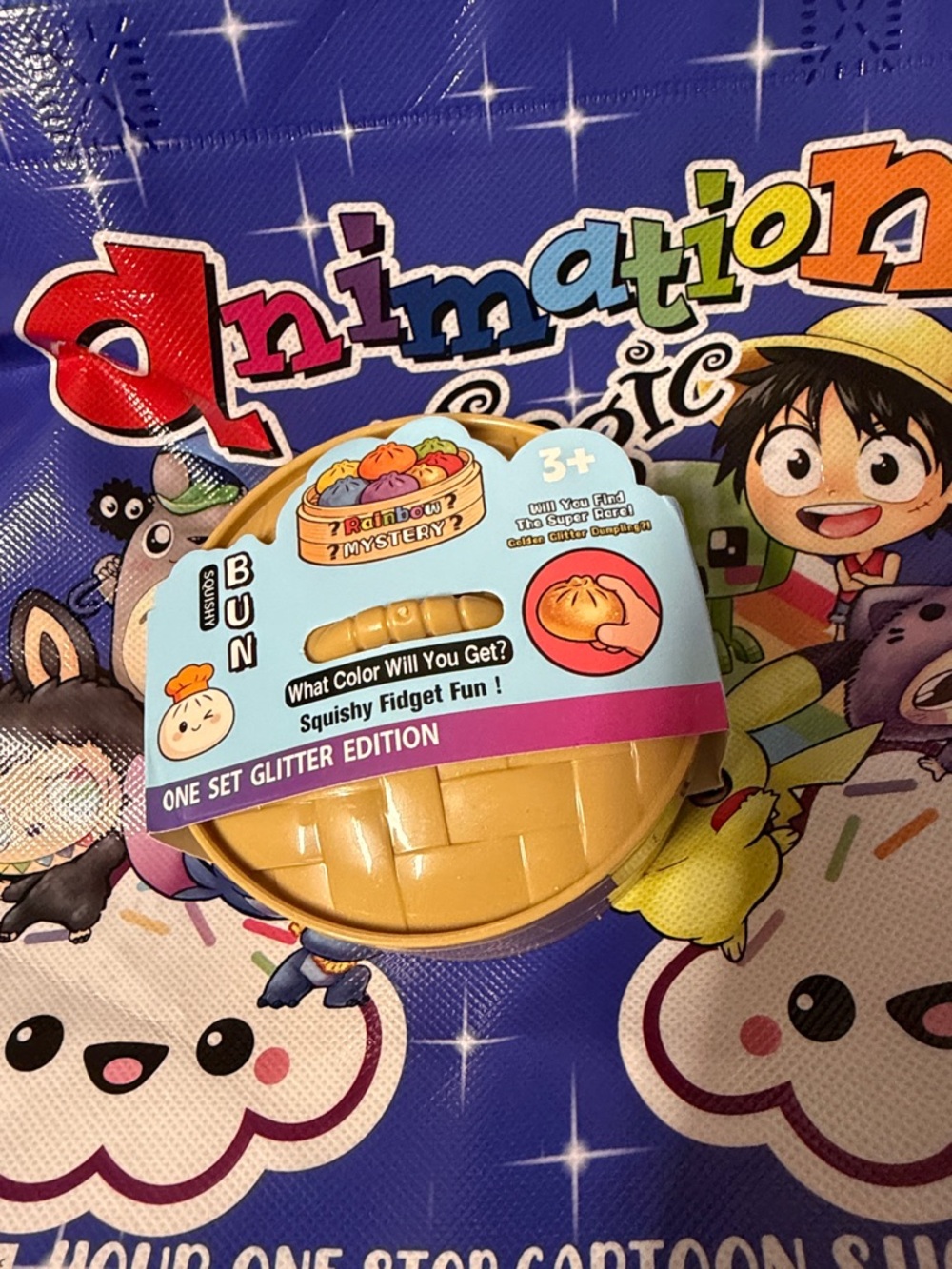 NWT Glitter Edition Squishy Bun Fidget Toy - Gold